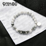 Howlite Turquoise Stone Bead Bracelet with Skull Head Charm