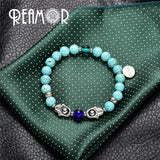 Stainless Steel Hamsa Hand Turquoise Beaded Stretch Bracelet