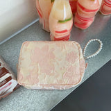 Relief Pattern Make Up Bag with Pearl Pendant