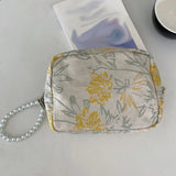Relief Pattern Make Up Bag with Pearl Pendant