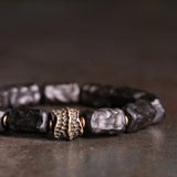 Hand Carved Ebony Bracelet with Unique Brass Charm