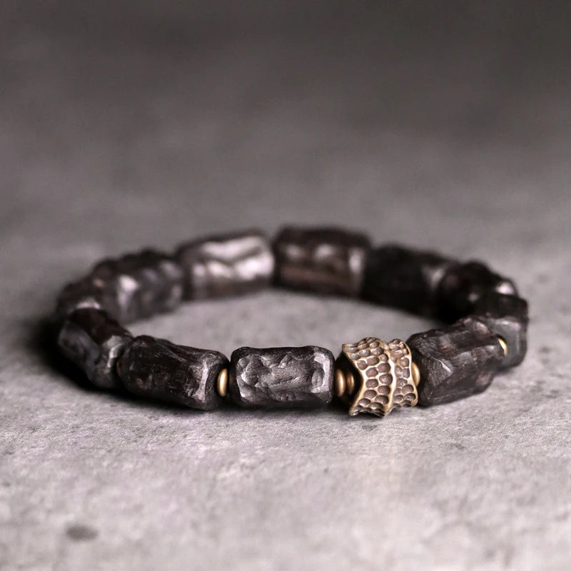 Hand Carved Ebony Bracelet with Unique Brass Charm