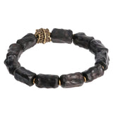 Hand Carved Ebony Bracelet with Unique Brass Charm