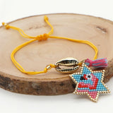 Rice Bead Bracelet Hand knit Beaded shell Pendant Devil's eye Bohemia