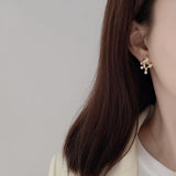S925 Silver Concave-convex Pearl Earrings Hollow Tri Studs