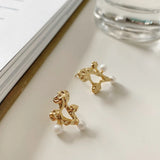 S925 Silver Concave-convex Pearl Earrings Hollow Tri Studs