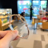S999 Sterling Silver Horseshoe Buckle Bangle
