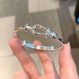 S999 Sterling Silver Horseshoe Buckle Bangle