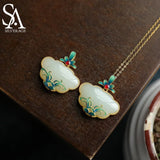 Sterling Silver Magnolia Flower and Hetian Jade Pendant Ruyi Necklace