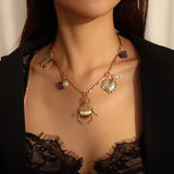 Exaggerated Gold Beetle Leaf Necklace with Pearl Stone Charms