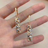 Geometric Hollow Pendant Earrings 585 Rose and Silver Dichroic Plating