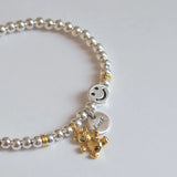 Silver Bead Bracelet with Smile Face Bear Pendant