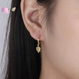 925 Silver Lightning Bolt CZ Huggie Earrings
