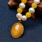 Slender Oval Pearl Necklace with Orange Beads Pendant