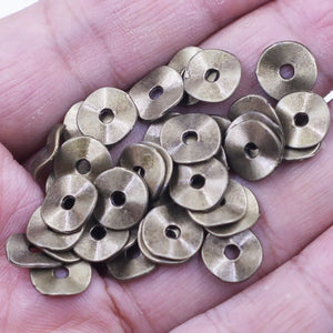 100Pcs Spacer Beads Wave Round Tortuose Ring Bronze Tone Charms Bracelets DIY