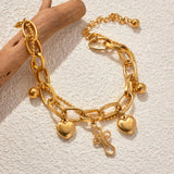 Stainless Steel Gold-Plated Layered Bracelet with Heart Cross Pendant
