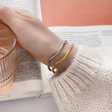 Stainless Steel Twisted Mosoobi Curve Line Bracelet Bangle Women