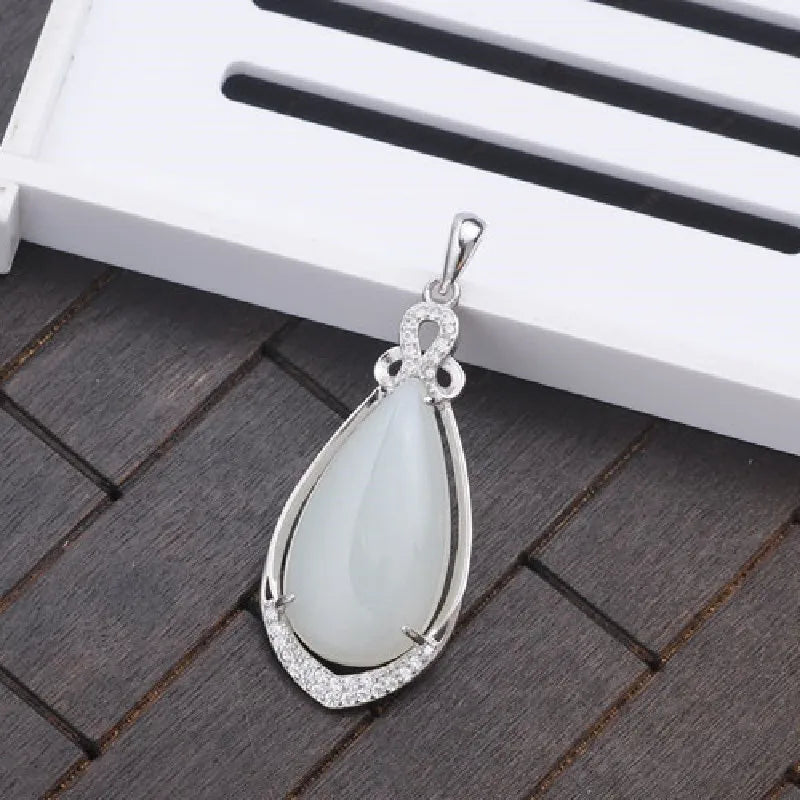 Natural Hetian Jade Pendant with 925 Silver Inlay