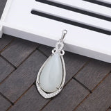 Natural Hetian Jade Pendant with 925 Silver Inlay