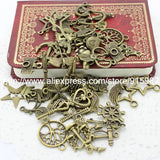Sweet Bell 100pcs Mixed Assorted Carved Charms Pendants Beads Alloy Pandent
