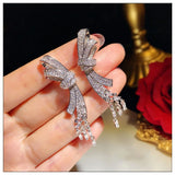 Silver Glitter Zircon Gemstone Bow Tassel Earrings