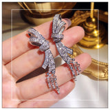 Silver Glitter Zircon Gemstone Bow Tassel Earrings
