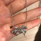 Bowknot Zircon 2-Piece Jewelry Set 925 Silver Necklace Earrings