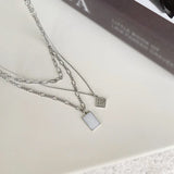Geometric Pendant Multilayer Necklace in Wind