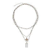 Geometric Pendant Multilayer Necklace in Wind
