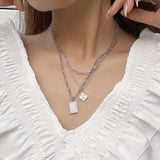 Geometric Pendant Multilayer Necklace in Wind