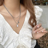 Geometric Pendant Multilayer Necklace in Wind