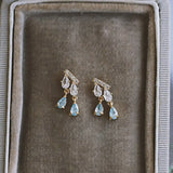 Designer Silver Inlaid Crystal Tassel Earrings