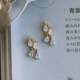 Designer Silver Inlaid Crystal Tassel Earrings
