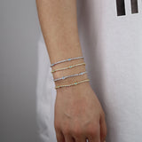 Thin CZ Tennis Chain Evil Eye Charm Bracelet
