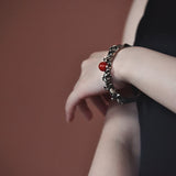 3D Silver Wave Charm Bracelet with Red Tourmaline Inlay