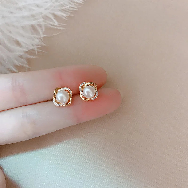 Elegant 14k Twist Stud Earrings with Zircon and Pearl