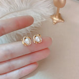 Elegant 14k Twist Stud Earrings with Zircon and Pearl