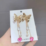 Vintage Fairy Bow Drill Pearl Powder Tassel Earrings