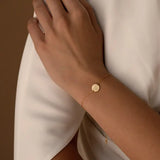 Wanderlust Disc Charm Bracelet by CaitlynMinimalist
