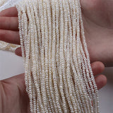 Natural Freshwater Pearl Strand 3-3.5mm Flat Button