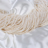 Natural Freshwater Pearl Strand 3-3.5mm Flat Button