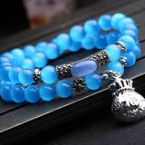Cat Eye Stone Bracelet with Money Bag Pendant