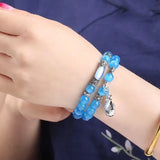 Cat Eye Stone Bracelet with Money Bag Pendant