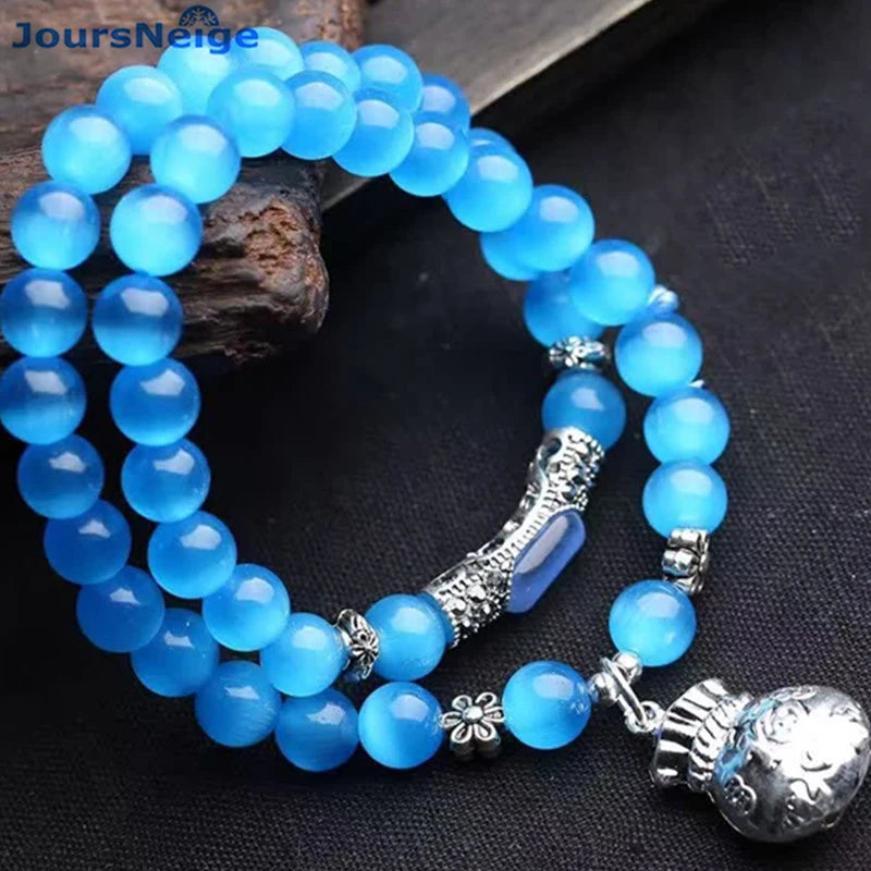 Cat Eye Stone Bracelet with Money Bag Pendant