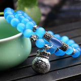 Cat Eye Stone Bracelet with Money Bag Pendant