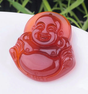 Carved Red Jade Laughing Buddha Pendant