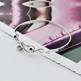Sterling Silver Bangle with Frosted Bead Pendant