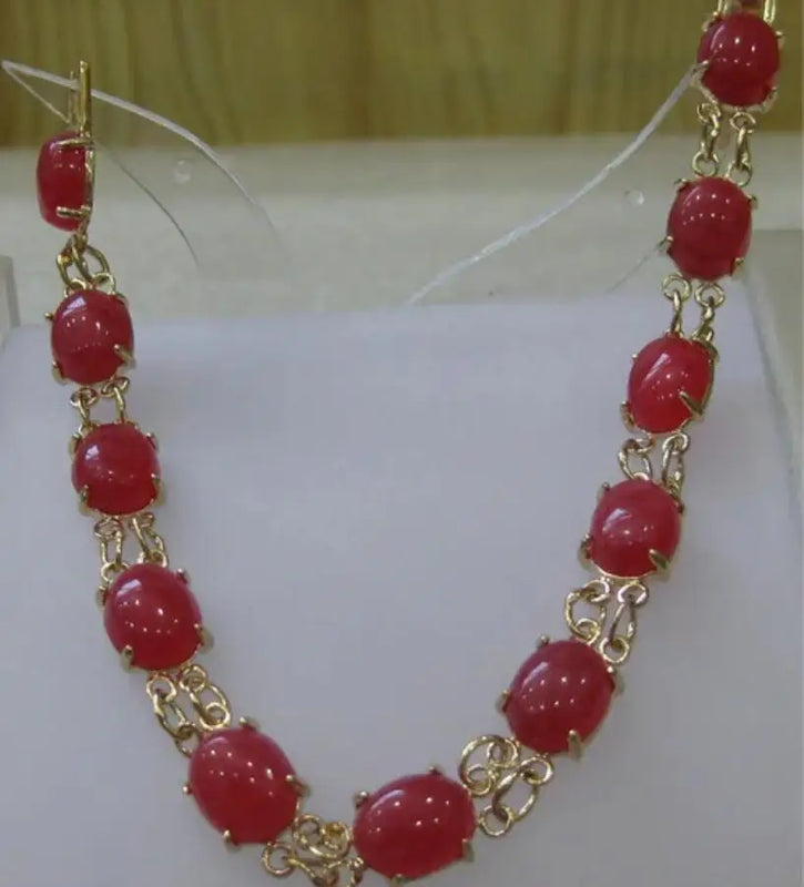 Red Jade Bracelet with Egg Shape Design