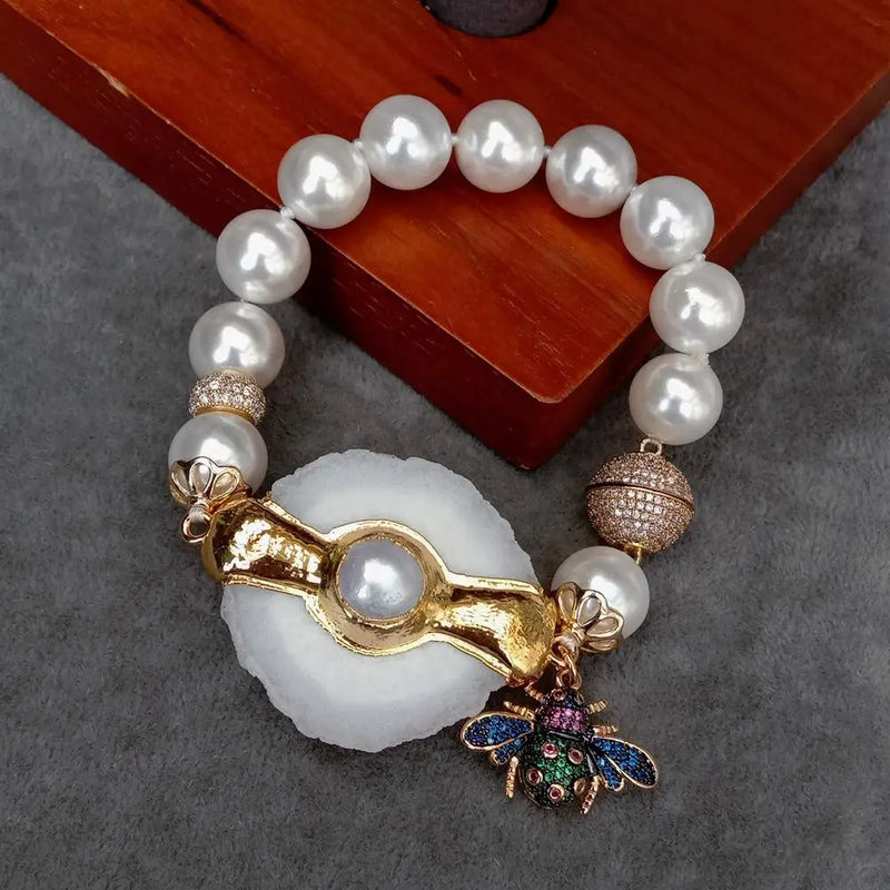 12mm Sea Shell Pearl Bracelet with 35x43mm Quartz Slice Cz Pave Insect Charm