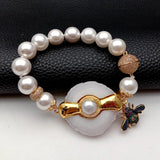 12mm Sea Shell Pearl Bracelet with 35x43mm Quartz Slice Cz Pave Insect Charm